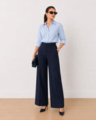 Henrietta navy blue herringbone texture cotton pants styled with a formal shirt