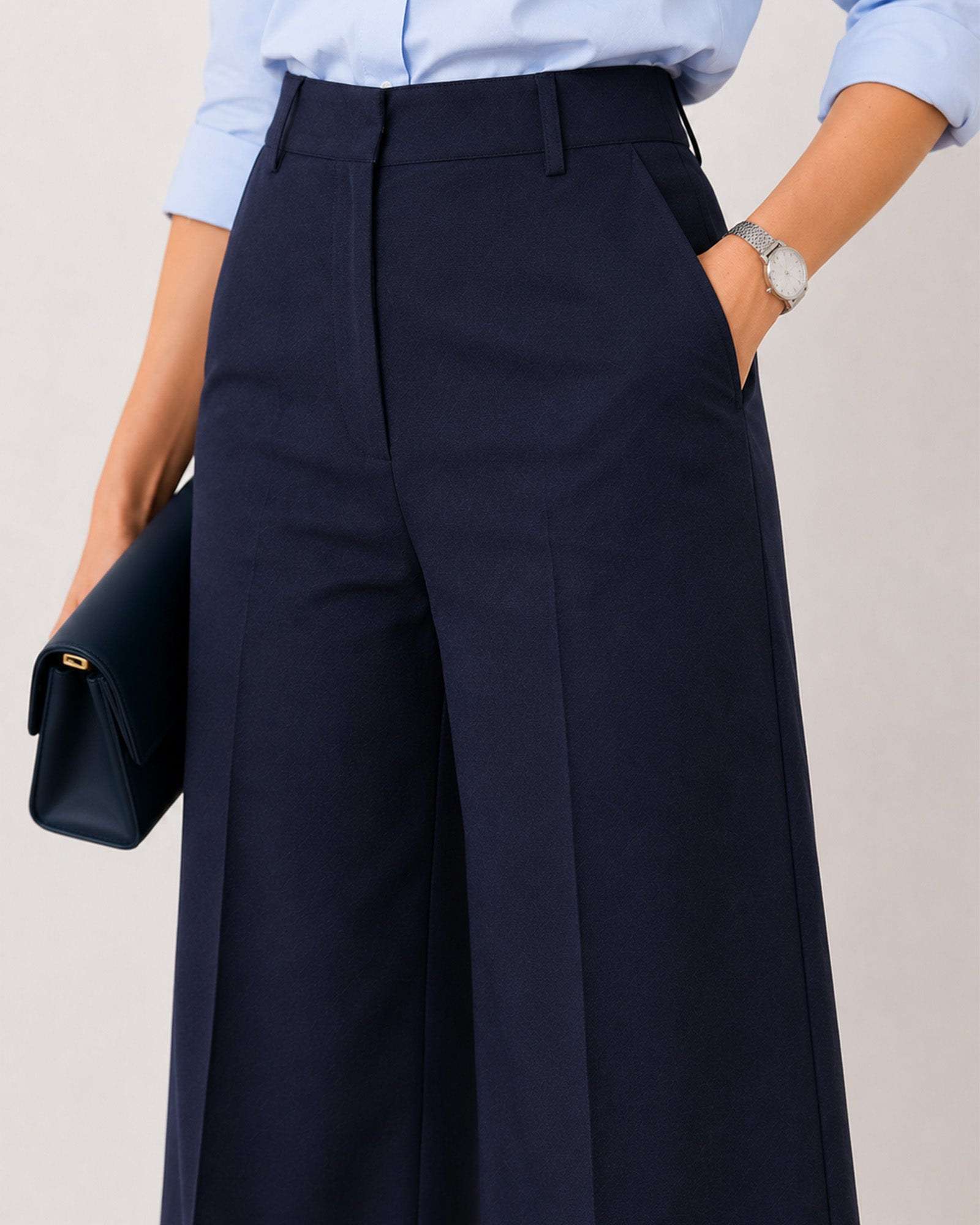Close-up of Henrietta navy blue straight pants showing cotton herringbone texture