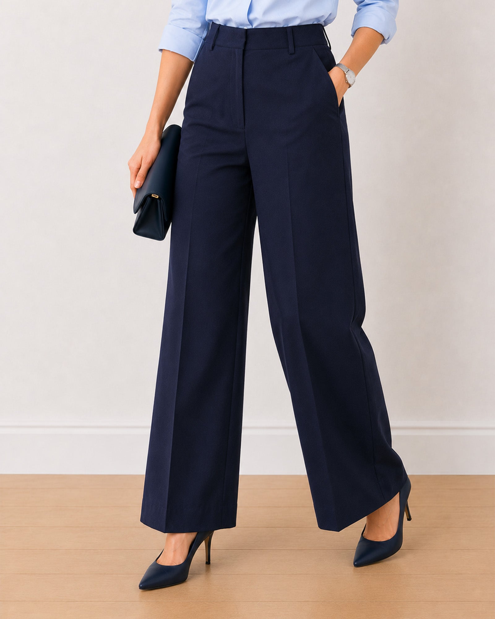 Henrietta navy blue herringbone texture pants, walking view showing straight wide leg