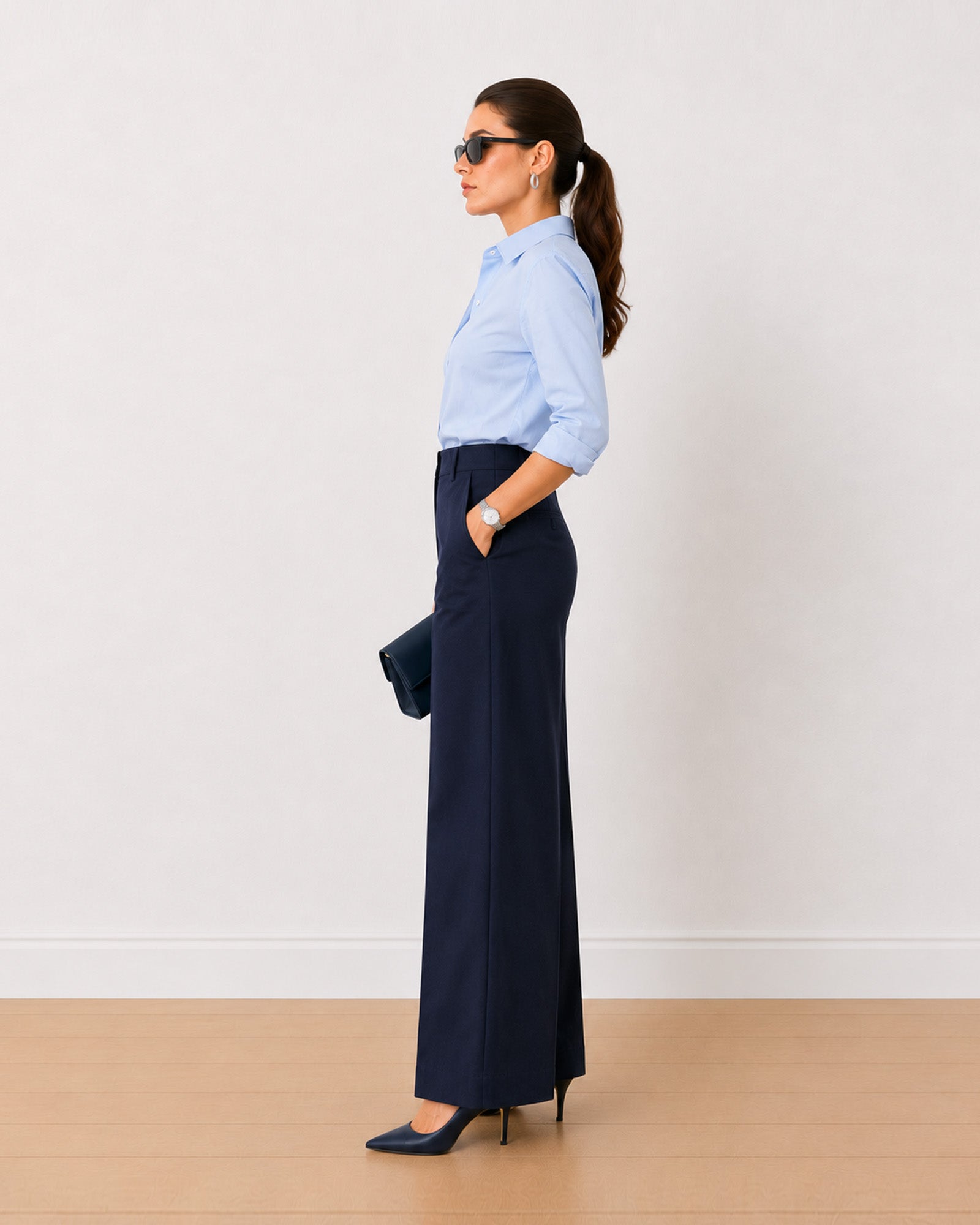 Henrietta navy blue herringbone texture straight pants, side profile with side pockets