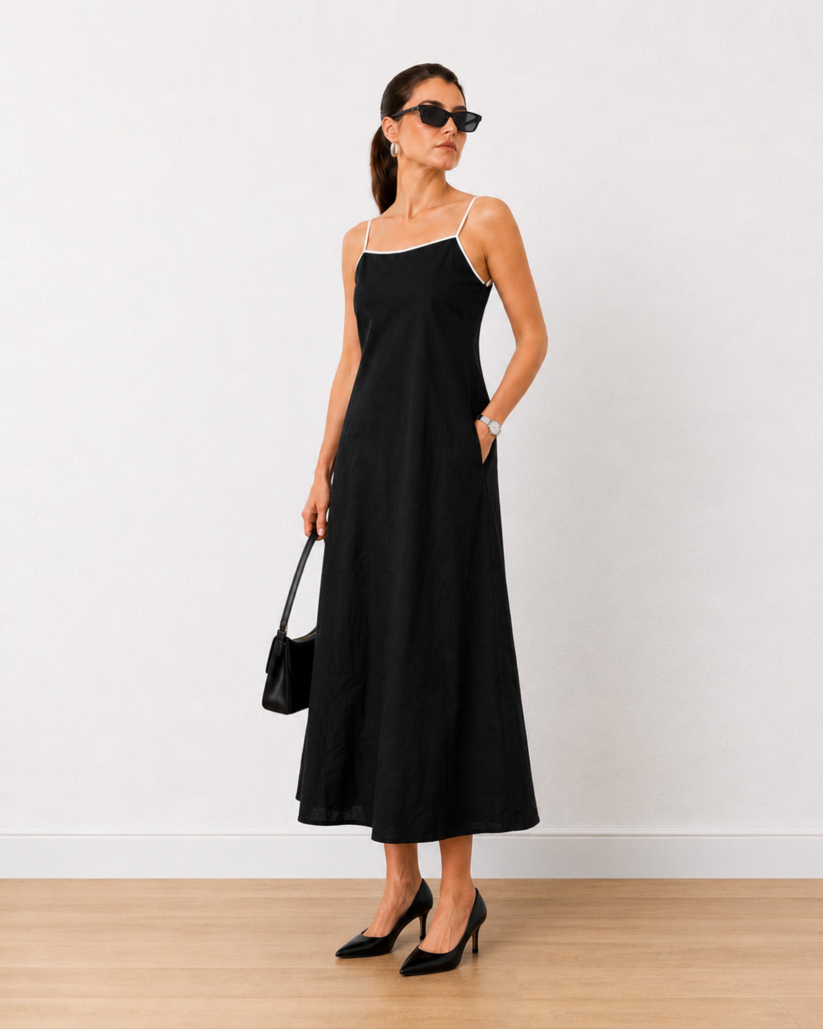 Holiday black linen maxi dress with cotton voile lining, adjustable straps and functional side pockets