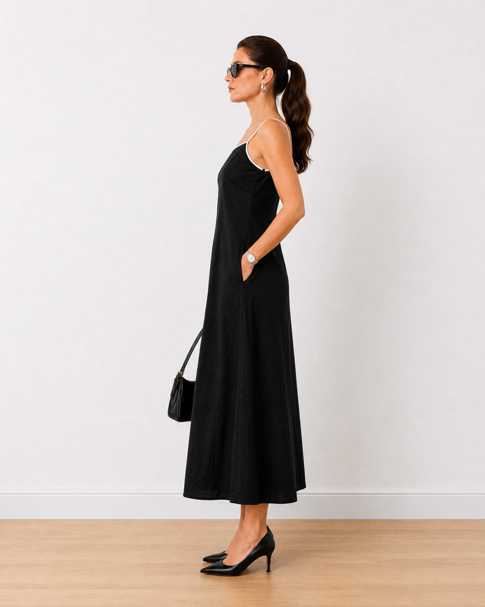 Holiday black linen noodle strap maxi dress with full cambric lining, side profile