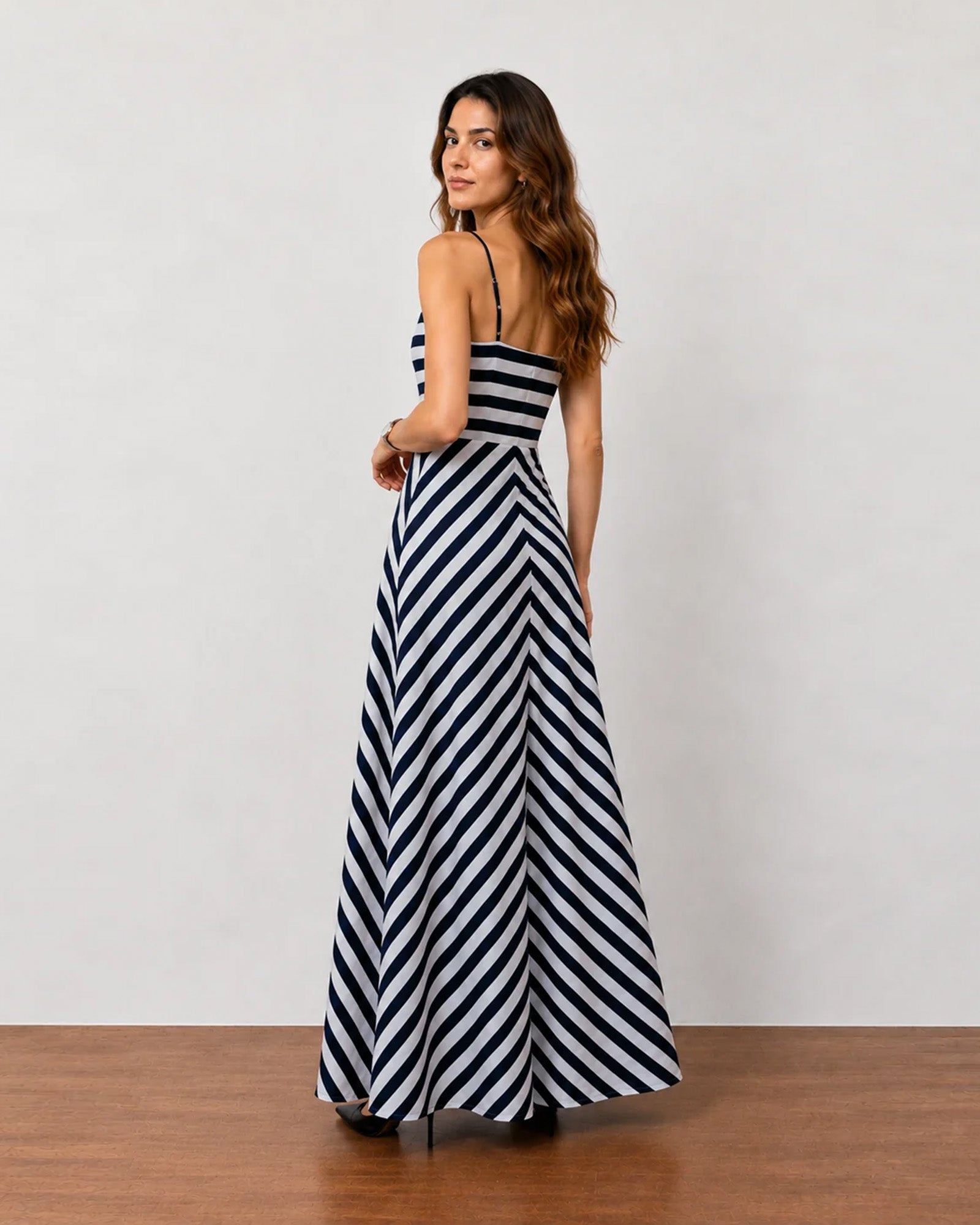 Hope black and white striped cotton maxi dress, back view showing flowy maxi length