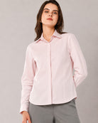 That baby pink cotton stretch shirt with a concealed front placket and hidden dignity buttons, close-up view