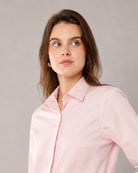 Close-up of That baby pink formal shirt structured collar and shoulder seam