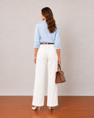 That sky blue stretch poplin formal shirt with a tailored back, back view